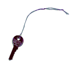 Padlock key on a string